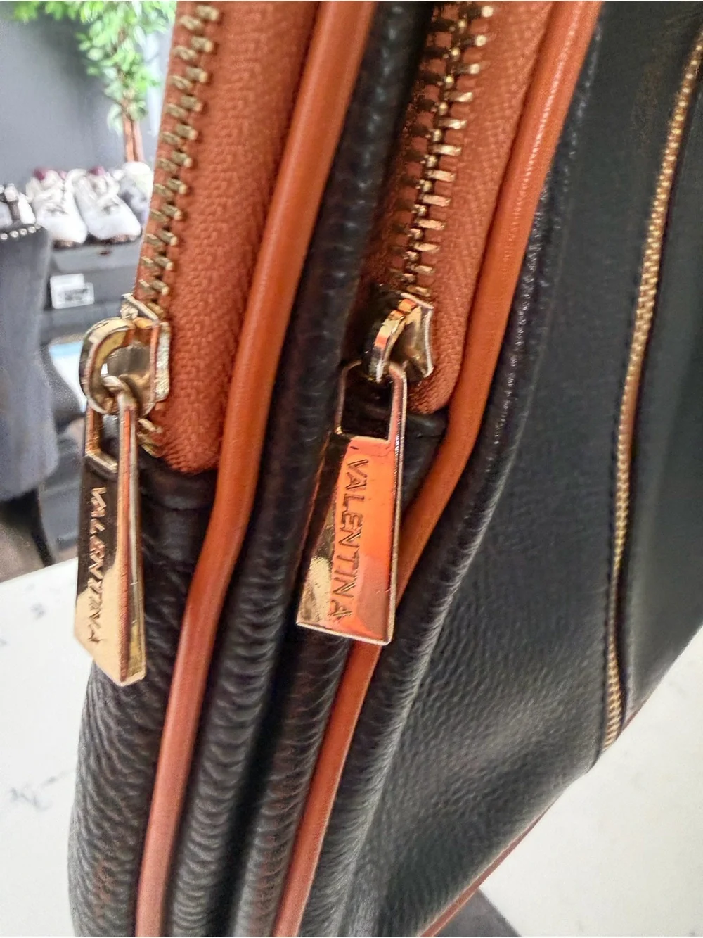 Valentina Black and Tan Leather Backpack with Gold Hardware